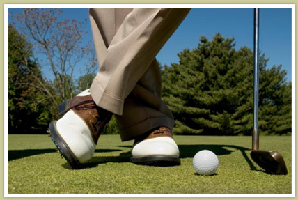 A man golfing